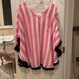 Swimsuit cover up.  Bright pink & white stripe with black fringe trim.  One size
